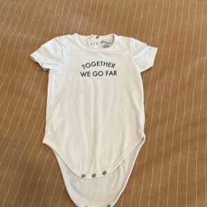6-9 month Peloton onesie